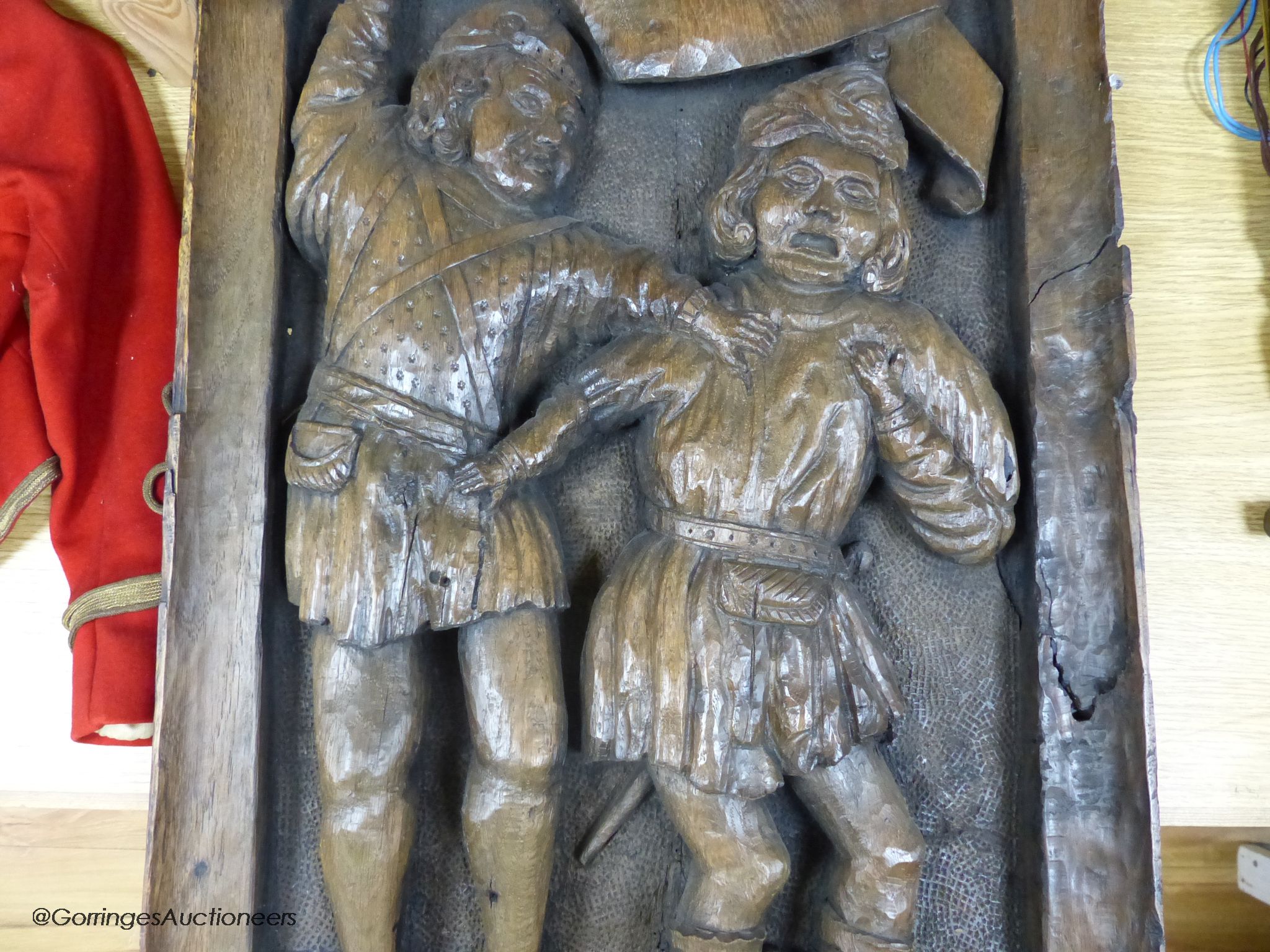 A 16th / 17th century carved oak panel